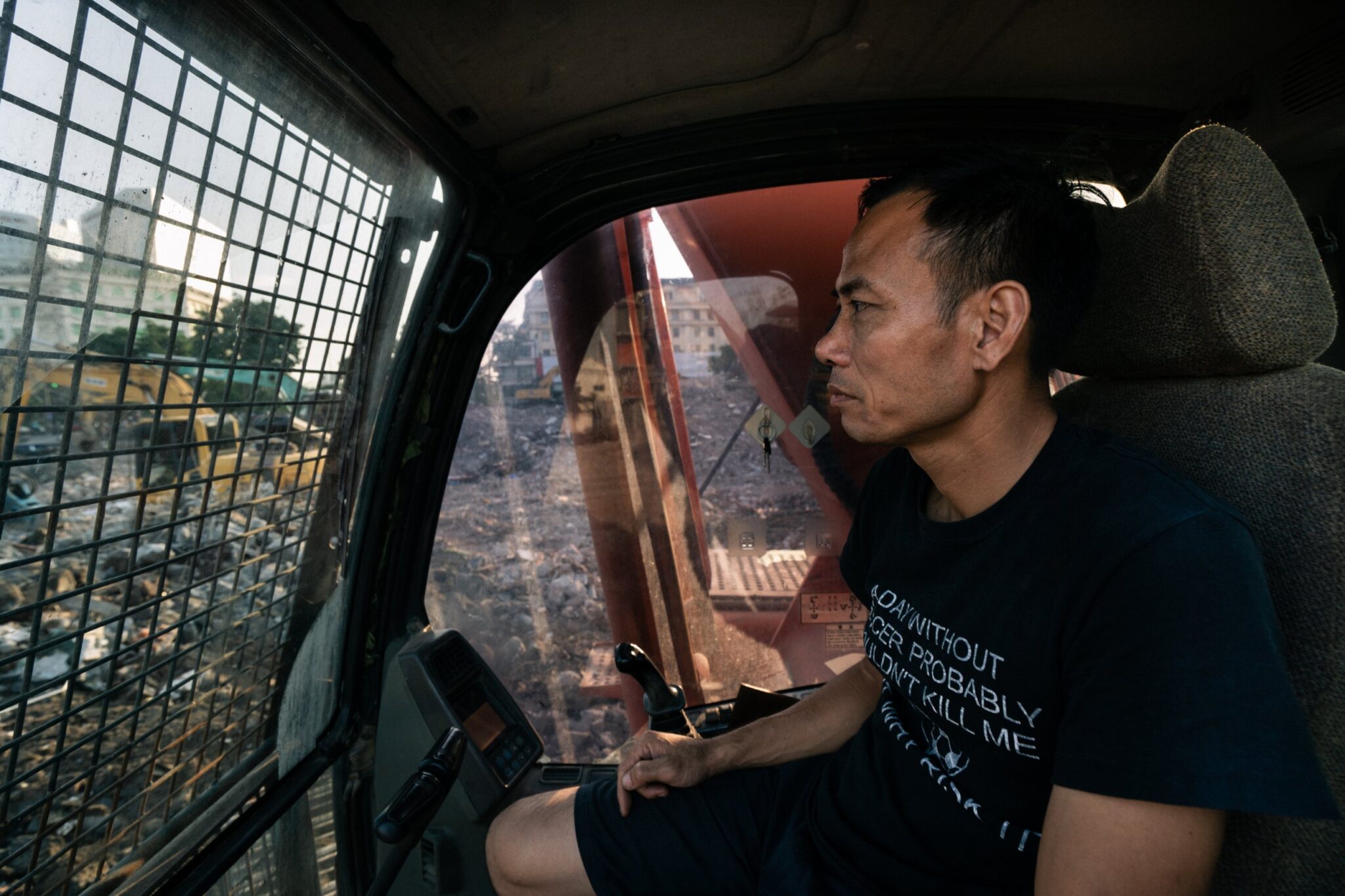 Excavator operator looking out from his cab